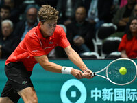 Alexander Blockx (BEL) is in action during the 2024 Davis Cup Finals Group Stage Bologna match between Italy and Belgium at Unipol Arena in...