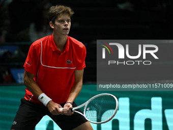 Alexander Blockx (BEL) is in action during the 2024 Davis Cup Finals Group Stage Bologna match between Italy and Belgium at Unipol Arena in...