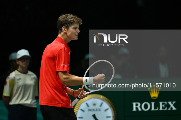 Alexander Blockx (BEL) is in action during the 2024 Davis Cup Finals Group Stage Bologna match between Italy and Belgium at Unipol Arena in...