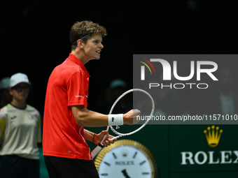 Alexander Blockx (BEL) is in action during the 2024 Davis Cup Finals Group Stage Bologna match between Italy and Belgium at Unipol Arena in...