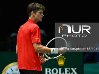 Alexander Blockx (BEL) is in action during the 2024 Davis Cup Finals Group Stage Bologna match between Italy and Belgium at Unipol Arena in...