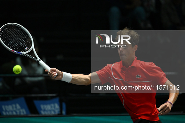 Alexander Blockx (BEL) is in action during the 2024 Davis Cup Finals Group Stage Bologna match between Italy and Belgium at Unipol Arena in...