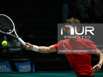 Alexander Blockx (BEL) is in action during the 2024 Davis Cup Finals Group Stage Bologna match between Italy and Belgium at Unipol Arena in...