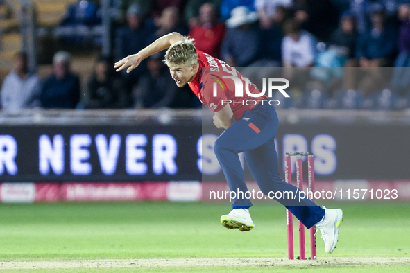 Sam Curran of England is in action during the Second Vitality T20 International match between England and Australia at Sofia Gardens in Card...