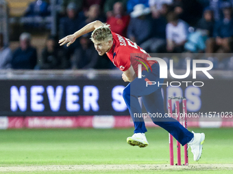 Sam Curran of England is in action during the Second Vitality T20 International match between England and Australia at Sofia Gardens in Card...