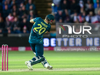 Aaron Hardie of Australia hits it over the boundary for 6 during the Second Vitality T20 International match between England and Australia a...