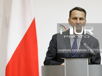 Minister of Foreign Affairs of the Republic of Poland Radoslaw Sikorski attends a joint news conference with Minister of Foreign Affairs of...