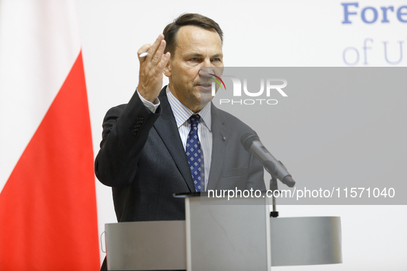 Minister of Foreign Affairs of the Republic of Poland Radoslaw Sikorski attends a joint news conference with Minister of Foreign Affairs of...