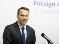 Minister of Foreign Affairs of the Republic of Poland Radoslaw Sikorski attends a joint news conference with Minister of Foreign Affairs of...