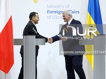 Minister of Foreign Affairs of Ukraine Andrii Sybiha shakes hands with Minister of Foreign Affairs of the Republic of Poland Radoslaw Sikors...