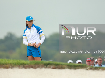 GAINESVILLE, VIRGINIA - SEPTEMBER 13: Albane Valenzuela of Team Europe folllows her putt on the 16th grenn during Foursome Matches on Day On...