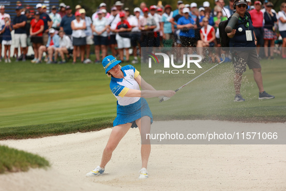 GAINESVILLE, VIRGINIA - SEPTEMBER 13: Madelene Sagstrom of of Team Europe hits out of the bunker toward the third green during Fourball Matc...