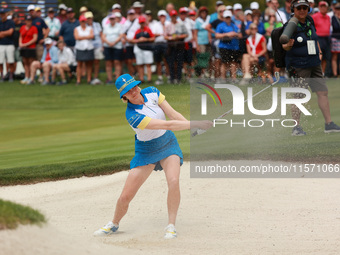 GAINESVILLE, VIRGINIA - SEPTEMBER 13: Madelene Sagstrom of of Team Europe hits out of the bunker toward the third green during Fourball Matc...