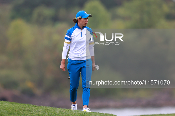 GAINESVILLE, VIRGINIA - SEPTEMBER 13: Carlota Ciganda of Team Europe walks on the 9th green during Day One of the Solheim Cup at Robert Tren...