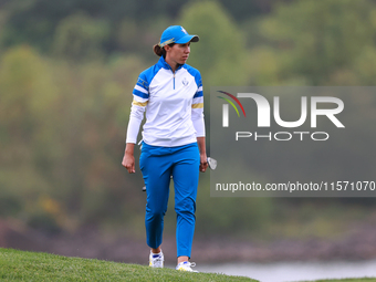 GAINESVILLE, VIRGINIA - SEPTEMBER 13: Carlota Ciganda of Team Europe walks on the 9th green during Day One of the Solheim Cup at Robert Tren...