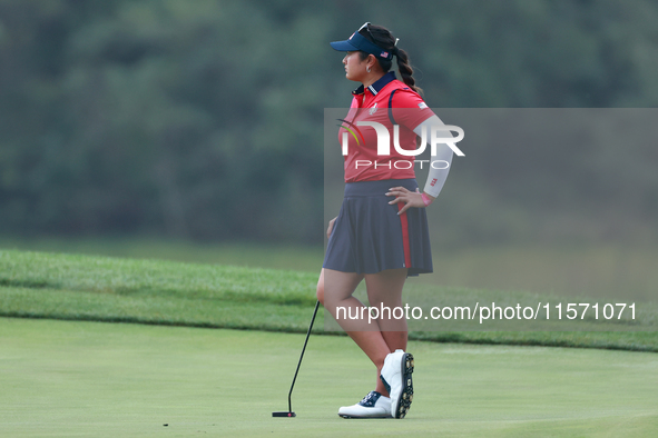 GAINESVILLE, VIRGINIA - SEPTEMBER 13: Lilia Vu of Team USA waits on the 9th green during Day One of the Solheim Cup at Robert Trent Jones Go...