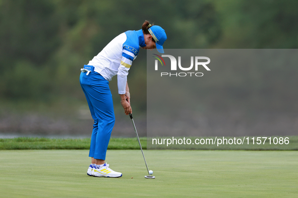 GAINESVILLE, VIRGINIA - SEPTEMBER 13: Carlota Ciganda of Team Europe putts on the 9th green during Day One of the Solheim Cup at Robert Tren...