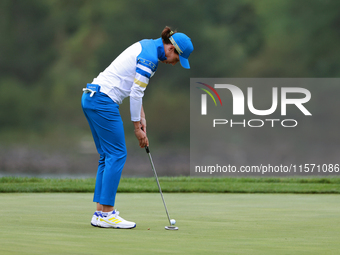 GAINESVILLE, VIRGINIA - SEPTEMBER 13: Carlota Ciganda of Team Europe putts on the 9th green during Day One of the Solheim Cup at Robert Tren...