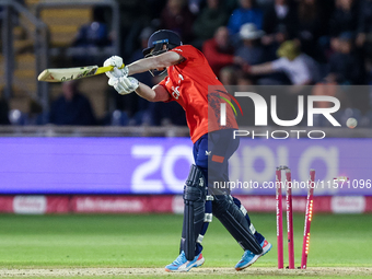 Jordan Cox of England is bowled by Sean Abbott of Australia during the Second Vitality T20 International match between England and Australia...