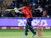 Jordan Cox of England is bowled by Sean Abbott of Australia during the Second Vitality T20 International match between England and Australia...