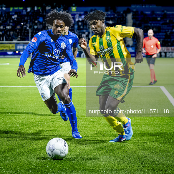 FC Den Bosch player Sheddy Barglan and ADO Den Haag player Joel Ideho during the match between Den Bosch and ADO at De Vliert for the Keuken...