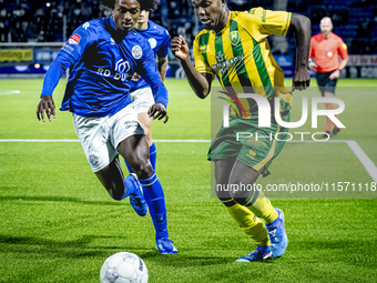 FC Den Bosch player Sheddy Barglan and ADO Den Haag player Joel Ideho during the match between Den Bosch and ADO at De Vliert for the Keuken...