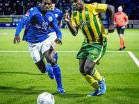 FC Den Bosch player Sheddy Barglan and ADO Den Haag player Joel Ideho during the match between Den Bosch and ADO at De Vliert for the Keuken...