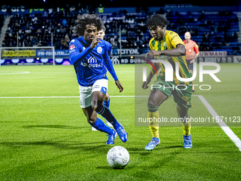 FC Den Bosch player Sheddy Barglan and ADO Den Haag player Joel Ideho during the match between Den Bosch and ADO at De Vliert for the Keuken...