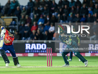 Jacob Bethell of England edges the ball to the boundary for 4 as Josh Inglis of Australia watches during the Second Vitality T20 Internation...