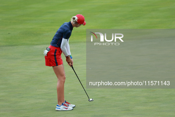 GAINESVILLE, VIRGINIA - SEPTEMBER 13: Nelly Korda of the United States follows her putt on the 14th green during Fourball Matches on Day One...