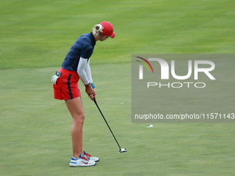 GAINESVILLE, VIRGINIA - SEPTEMBER 13: Nelly Korda of the United States follows her putt on the 14th green during Fourball Matches on Day One...