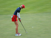 GAINESVILLE, VIRGINIA - SEPTEMBER 13: Nelly Korda of the United States follows her putt on the 14th green during Fourball Matches on Day One...