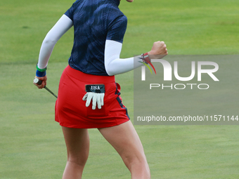 GAINESVILLE, VIRGINIA - SEPTEMBER 13: Nelly Korda of the United States reacts to her putt on the 14th green during Fourball Matches on Day O...