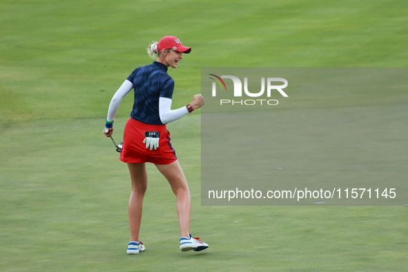 GAINESVILLE, VIRGINIA - SEPTEMBER 13: Nelly Korda of the United States reacts to her putt on the 14th green during Fourball Matches on Day O...