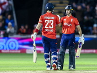 #23, Liam Livingstone of England, is congratulated for his half-century by #82, Jacob Bethell, during the Second Vitality T20 International...