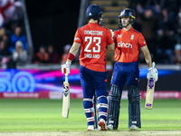 #23, Liam Livingstone of England, is congratulated for his half-century by #82, Jacob Bethell, during the Second Vitality T20 International...