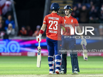 #23, Liam Livingstone of England, is congratulated for his half-century by #82, Jacob Bethell, during the Second Vitality T20 International...