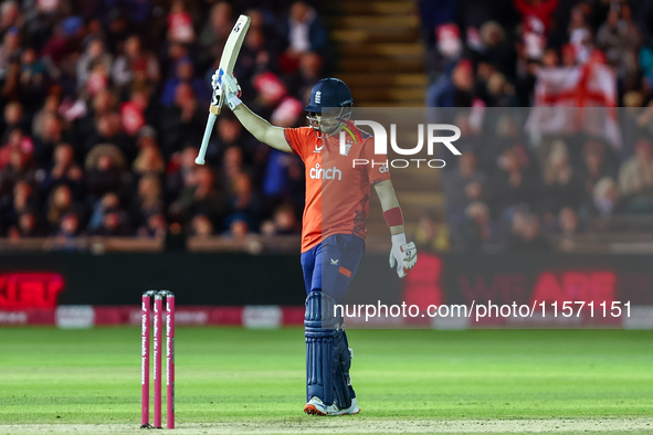 Liam Livingstone of England celebrates his half-century during the Second Vitality T20 International match between England and Australia at...