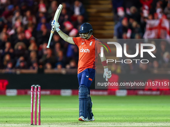 Liam Livingstone of England celebrates his half-century during the Second Vitality T20 International match between England and Australia at...