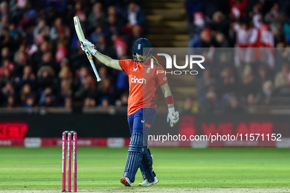 Liam Livingstone of England celebrates his half-century during the Second Vitality T20 International match between England and Australia at...