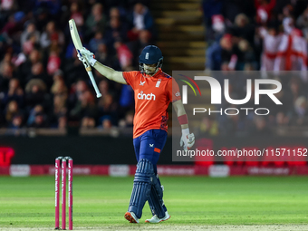 Liam Livingstone of England celebrates his half-century during the Second Vitality T20 International match between England and Australia at...