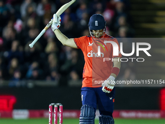 Liam Livingstone of England celebrates his half-century during the Second Vitality T20 International match between England and Australia at...