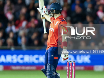 Liam Livingstone of England celebrates his half-century during the Second Vitality T20 International match between England and Australia at...