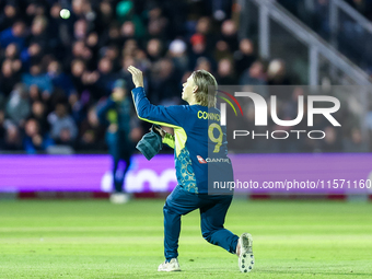 Cooper Connolly of Australia receives the ball as he prepares to bowl during the Second Vitality T20 International match between England and...