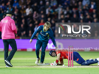 #9, Cooper Connolly of Australia, and #23, Liam Livingstone of England share a moment of levity following a collision and fall during the Se...