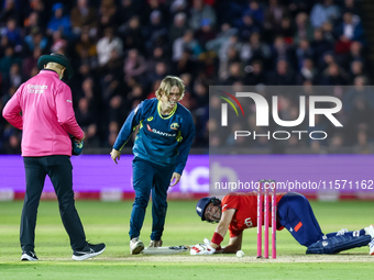 #9, Cooper Connolly of Australia, and #23, Liam Livingstone of England share a moment of levity following a collision and fall during the Se...