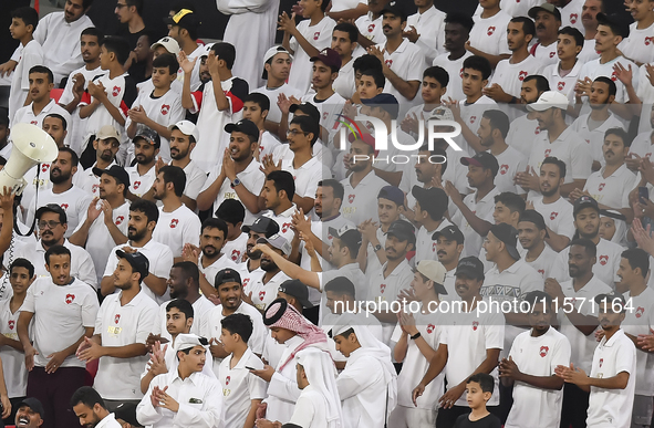 Fans of Al Rayyan SC cheer during the Ooredoo Qatar Stars League 24/25 match between Al Rayyan SC and Al Shahania SC at Ahmad Bin Ali Stadiu...