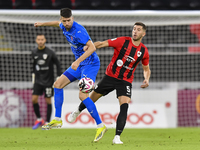 David Garcia (R) of Al Rayyan SC battles for the ball with Petrus Amersfoort (L) of Al Shahania SC during the Ooredoo Qatar Stars League 24/...