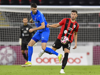 David Garcia (R) of Al Rayyan SC battles for the ball with Petrus Amersfoort (L) of Al Shahania SC during the Ooredoo Qatar Stars League 24/...