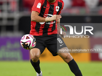 Mahmoud Ahmed Hassan of Al Rayyan SC plays in the Ooredoo Qatar Stars League 24/25 match between Al Rayyan SC and Al Shahania SC at Ahmad Bi...